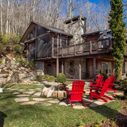 Rustic Backyard With Red Chairs