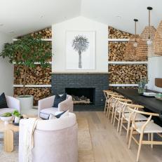 Eclectic Dining Room With Firewood
