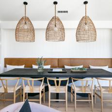 Scandinavian Dining Room With Woven Pendants