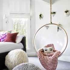 Eclectic Sitting Area With Face Pillow