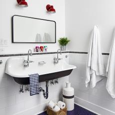 Bright Bathroom Features a Freestanding Farmhouse Sink, Red Pendants and Chrome Fixtures