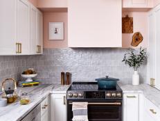 Marble Countertops Meet White Cabinets in Pretty Pink Kitchen