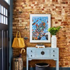 Bohemian Foyer With Exposed Brick