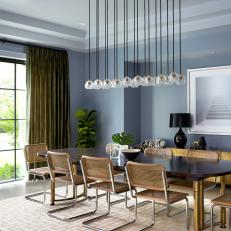 Blue Gray Contemporary Dining Room With Green Curtains