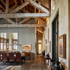Rustic Dining Room With Barn Beams
