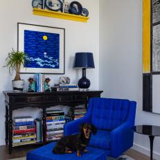 Modern Sitting Area With Blue Vintage Armchair