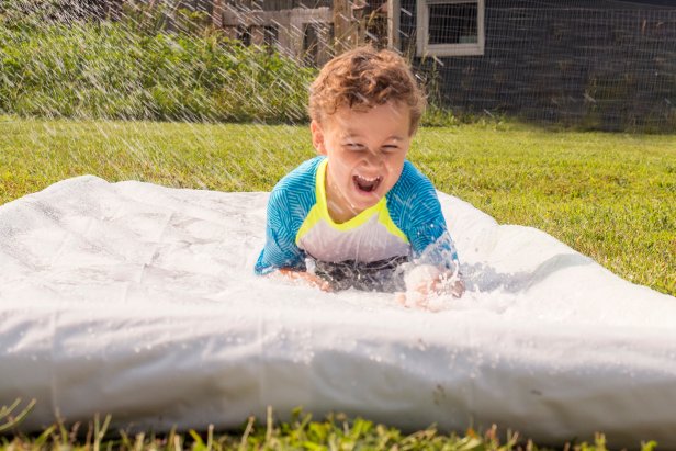 A DIY slip and slide provides hours of fun for the kids - and adults, too!