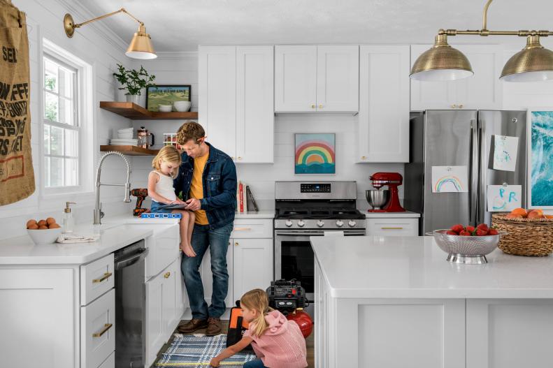HGTV Dream Home photographer Robert Peterson renovated the kitchen of his own 1970s Atlanta ranch with a modest budget under $15K. Dedicated to a healthy lifestyle, his daughters Grace and River are very much involved with the family's daily tasks.