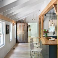 Farmhouse Galley Kitchen With Reclaimed Wood Beams
