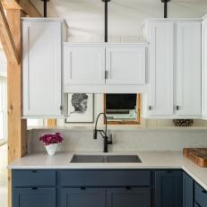 Two-Tone Cabinets Contrasted by Reclaimed Wood Beams