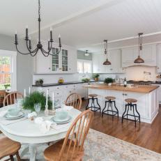 Country Eat-In Kitchen With White Dining Table
