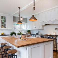White Country Kitchen With Round Stools