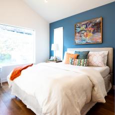 Contemporary Bedroom With Blue Accent Wall