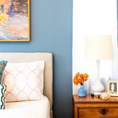 Blue Bedroom With Orange Flowers