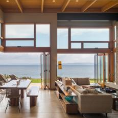 Waterfront Living Area With Folding Doors