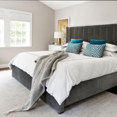 Transitional Bedroom With Teal Pillows