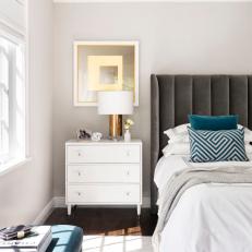 Transitional Bedroom With Gold Table Lamp