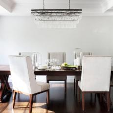 Transitional Dining Room With Cloche