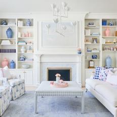 Blue and Pink Cottage Living Room With Check Pillows