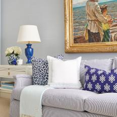Blue Cottage Sitting Area With Striped Sofa