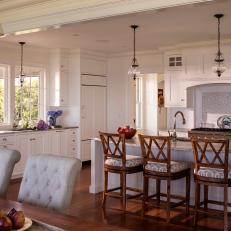 White Cottage Open Plan Kitchen With Brown Barstools