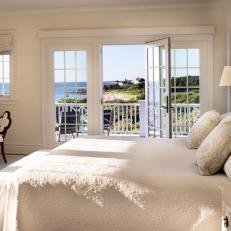 White Cottage Bedroom With Oceanfront Balcony