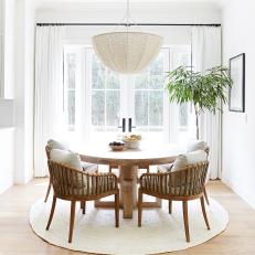White Transitional Dining Room With Round Rug