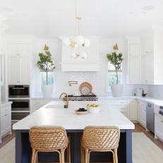 White Transitional Chef Kitchen With Woven Stools
