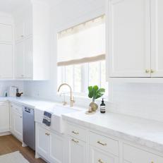 White Transitional Kitchen With Brass Knobs