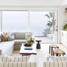 Open-Concept Living Space With Window Wall to Ocean