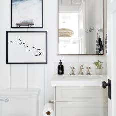 White Adds Scale in Small Guest Bathroom