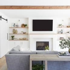 Scandinavian Living Room With Barn Door
