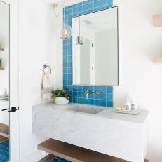 Small Bathroom With Asymmetrical Blue Tile