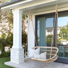Porch With Wicker Swing