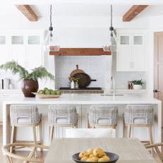 Neutral Open Plan Kitchen With Cane Barstools