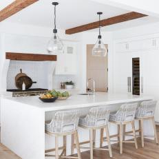 Scandinavian Chef Kitchen With Cane Barstools