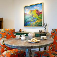Eclectic Southwestern Breakfast Nook With Orange Chairs