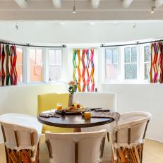 Eclectic Southwestern Dining Room With Rainbow Curtains
