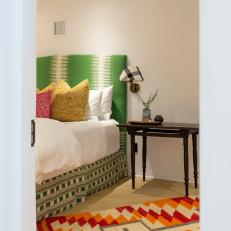 Eclectic Southwestern Bedroom With Orange Rug