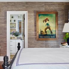Traditional Coastal Bedroom in Vacation Cottage with Vintage Pub Sign Art 