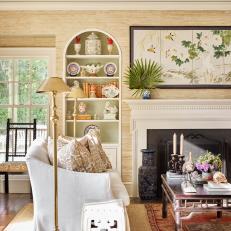 Traditional Coastal Living Room with Grass Cloth, Built-In Shelves and White Sofas