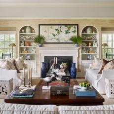 Traditional Coastal Living Room with Built-In Shelves, Mantel and Sofas