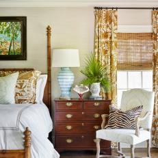 Traditional White Bedroom with Antique Dresser and Coastal Accents 