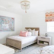 Scandinavian Bedroom With Orange Shade