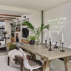 Eclectic Dining Area With Neon Sign