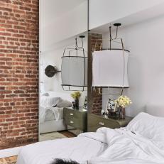 Eclectic Master Bedroom With Brick Wall