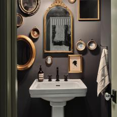 Gray Victorian Powder Room With Mirrors