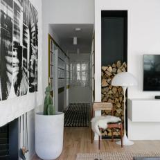 Eclectic Living Room With Firewood