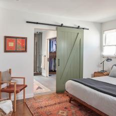 Midcentury Modern Bedroom With Green Barn Door