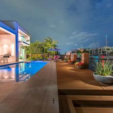 Modern Waterfront Backyard With Container Gardens